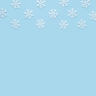 Snowflake baby blue background with copy space