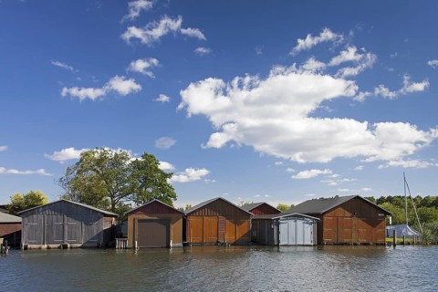 Wooden boat houses on the banks of the Plauer See at Plau am See
