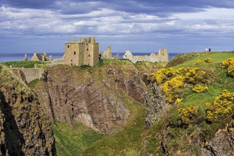 Tourists looking at Dunnottar Castle