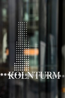Cologne Tower lettering in the glass entrance door