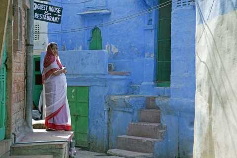 Woman wearing traditional sari in the blue city of Jodhpur