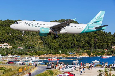 A Cyprus Airways Airbus A320 aircraft with registration 5B-DDQ at Skiathos Airport