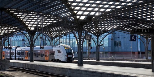 Local train with platform roofing at Cologne Central Station