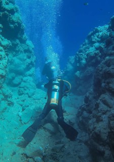 Diver at dive site The Bells