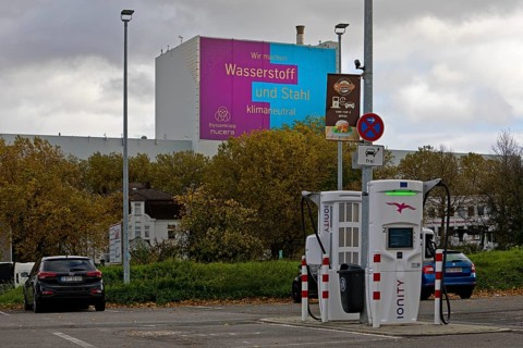 Charging station and large poster for climate steel at the ThyssenKrupp Steel Europe plant