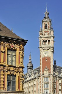 Decorated historical facade and bell tower of Chamber of Commerce at the quarter Vieux-Lille