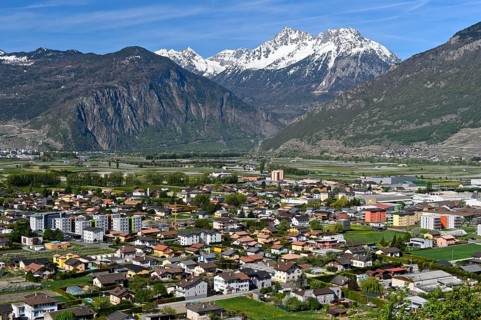 The village of Charrat in the wide Rhone valley in Lower Valais