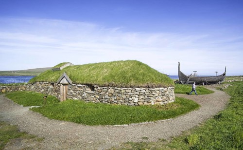 Reconstruction of Norse Viking longhouse and the Skidbladner