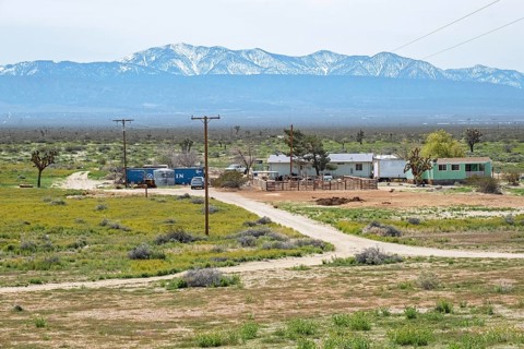 Small farm on the countryside in front of the San Gabriel Mountains