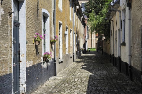 Narrow alleys with old houses of beguines in the beguinage of Lier