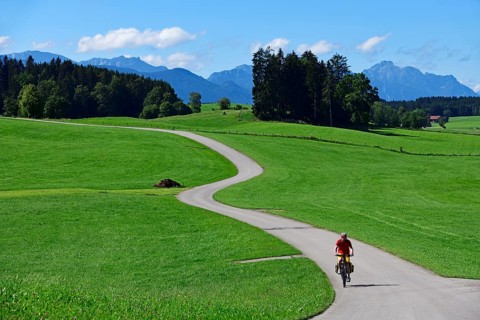 Cyclist on the Romantic Road near Steingaden