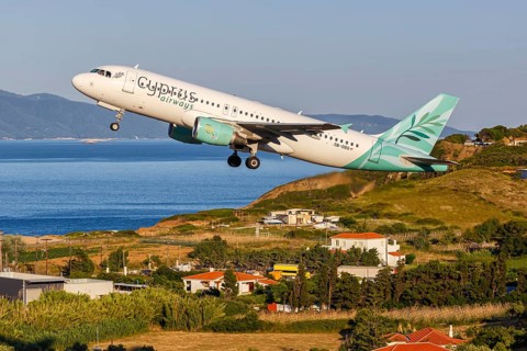 A Cyprus Airways Airbus A320 aircraft with registration 5B-DDQ at Skiathos Airport