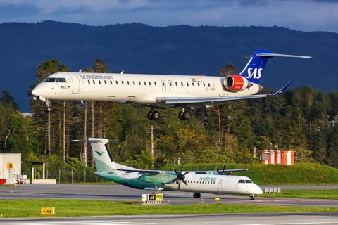 A Bombardier CRJ900 aircraft of SAS Scandinavian Airlines with the registration EI-FPP at Bergen Airport