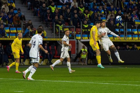 Giovanni DI LORENZO Italy right in a header duel with Taras STEPANENKO Ukraine