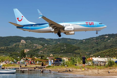 A TUI Airways Boeing 737-800 aircraft with the registration G-FDZZ at Skiathos Airport
