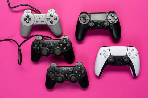 Different generations of game controllers of the Playstation game console