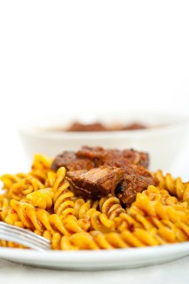 Fusilli pasta al dente with neapolitan style ragu meat sauce very different from bolognese style
