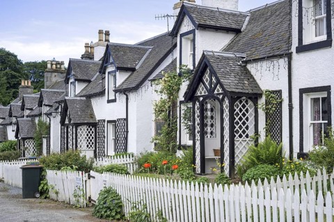 Row of white houses in the village Kenmore