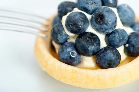 Fresh blueberry cream cupcake homemade closeup macro