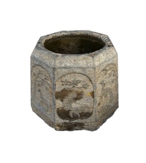 Ancient stone bucket finely carved with iced water over white backgroungd