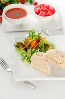 Tuna fish and cheese sandwich with fresh mixed salad