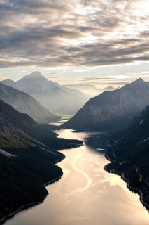 View of the Plansee lake from Schoenjoechl at sunset