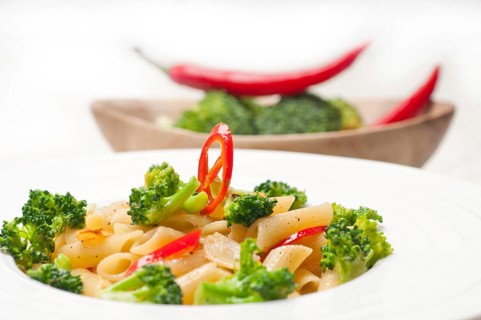 Classic Italian penne pasta with broccoli and red chili pepper