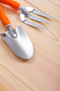 Agricultural tools Spade and fork on wooden boards