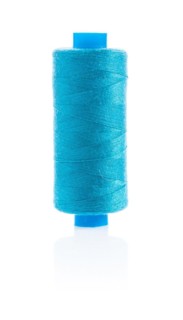 Blue sewing thread on bobbin
