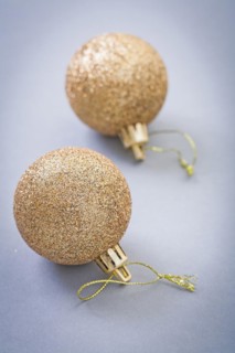 Golden christmas balls on grey background