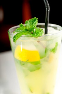 Mojito caipirina cocktail with fresh mint leaves
