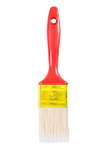 A brush with a red handle