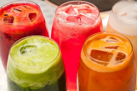 Selection of fresh fruits colorful long drink cocktails