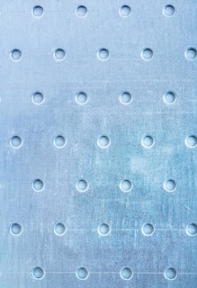Design concept for drilled stainless steel sheets