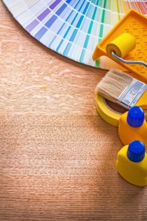 Home improvement colour tools and pantone fan on wooden board maintenance concept