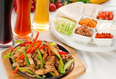 Original fajita sizzling smoking hot served on iron plate