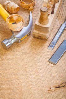 Chisel hammer Joiner's plane on wooden board