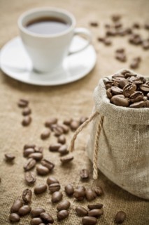 Coffee beans and cup of coffee