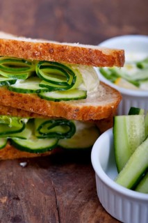 Fresh vegetarian sandwich with garlic cheese dip salad on rustic table