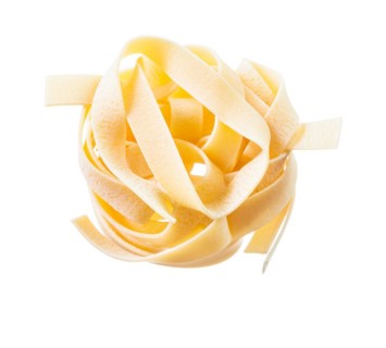 Raw pasta isolated on white