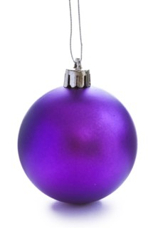 Single blue coloured Christmas bauble against a white background