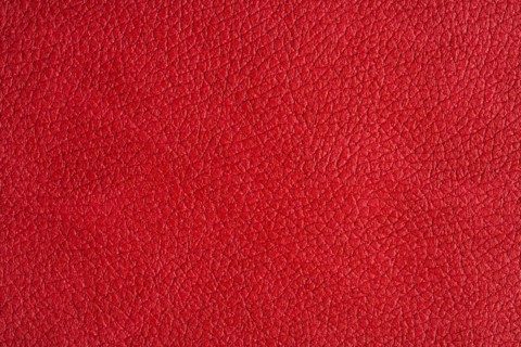 Close-up on red leather texture studio shot