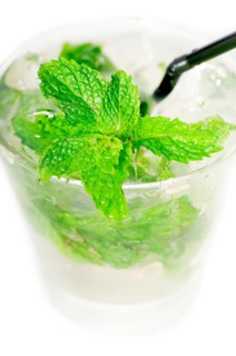 Mojito caipirina cocktail with fresh mint leaves