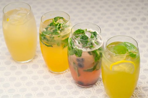 Selection of fresh fruits colorful long drink cocktails