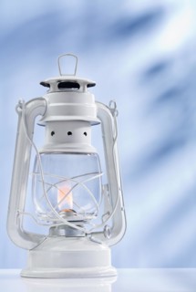 Paraffin lamp on a blue background