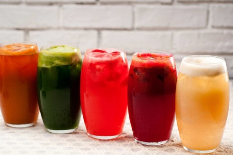 Selection of fresh fruits colorful long drink cocktails
