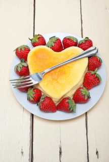 Heart shaped cheesecake with strawberryes ideal cake for valentine day