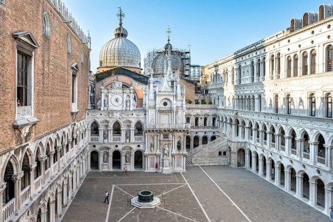 View of the inner courtyard of the Doge's Palace with St Mark's Basilica and giant staircase