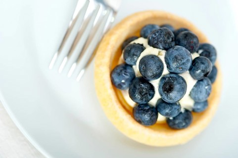Fresh blueberry cream cupcake homemade closeup macro