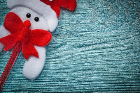 Father Christmas decoration on wooden board copy space New Year concept